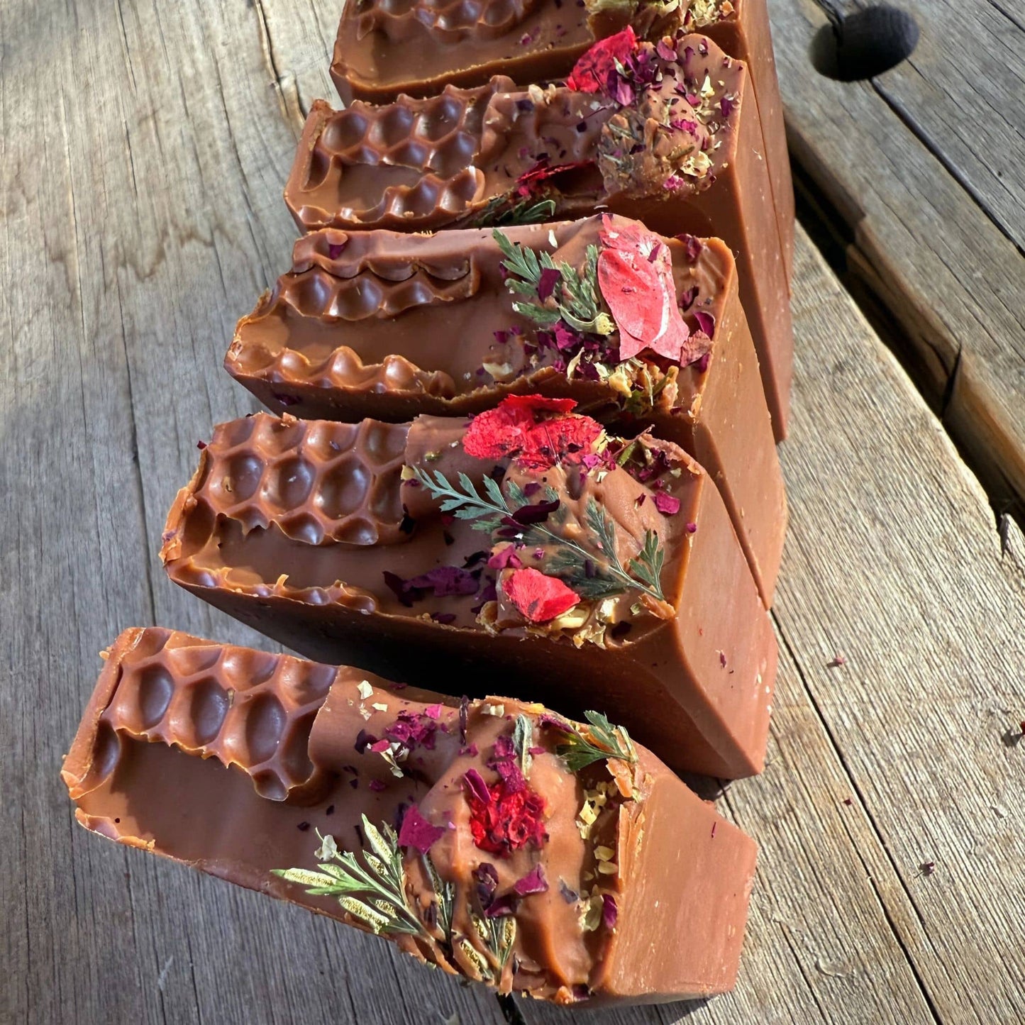Casablanca Curing Clay soap, showcasing tallow-based skincare with Moroccan clay and propolis on wood.