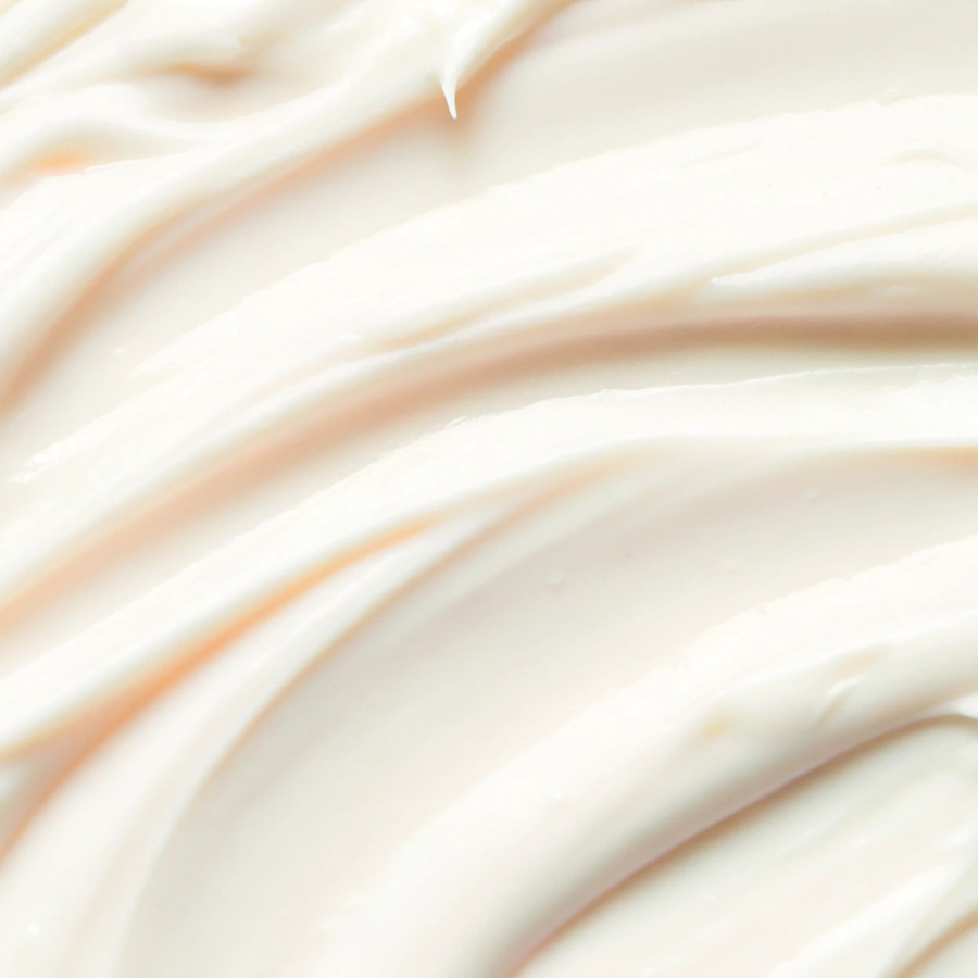 A close up of a creamy tallow lotion texture