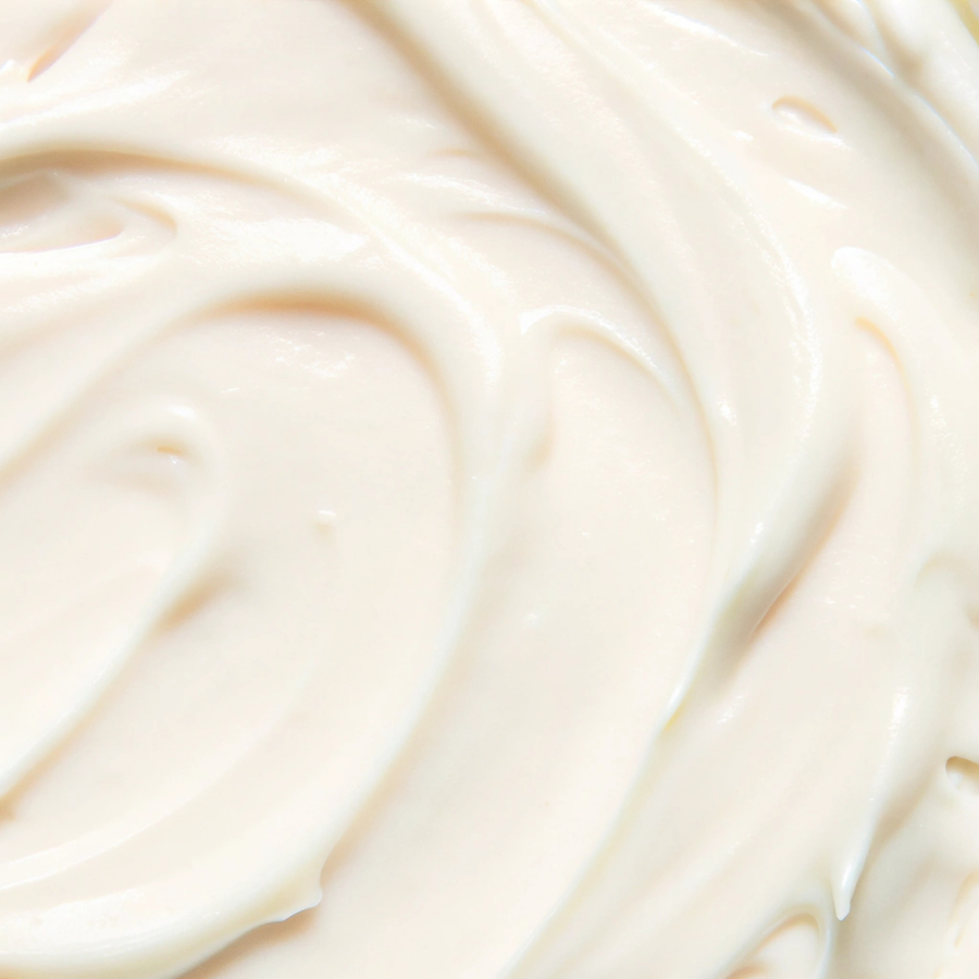 A close up of tallow lotion texture.