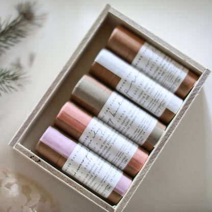 Swatches of natural earth pigment cream makeup tints on skin