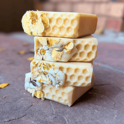 Stacked Apricot Freesia soap bars showcasing honeycomb texture, dried flowers, and creamy peach coloring