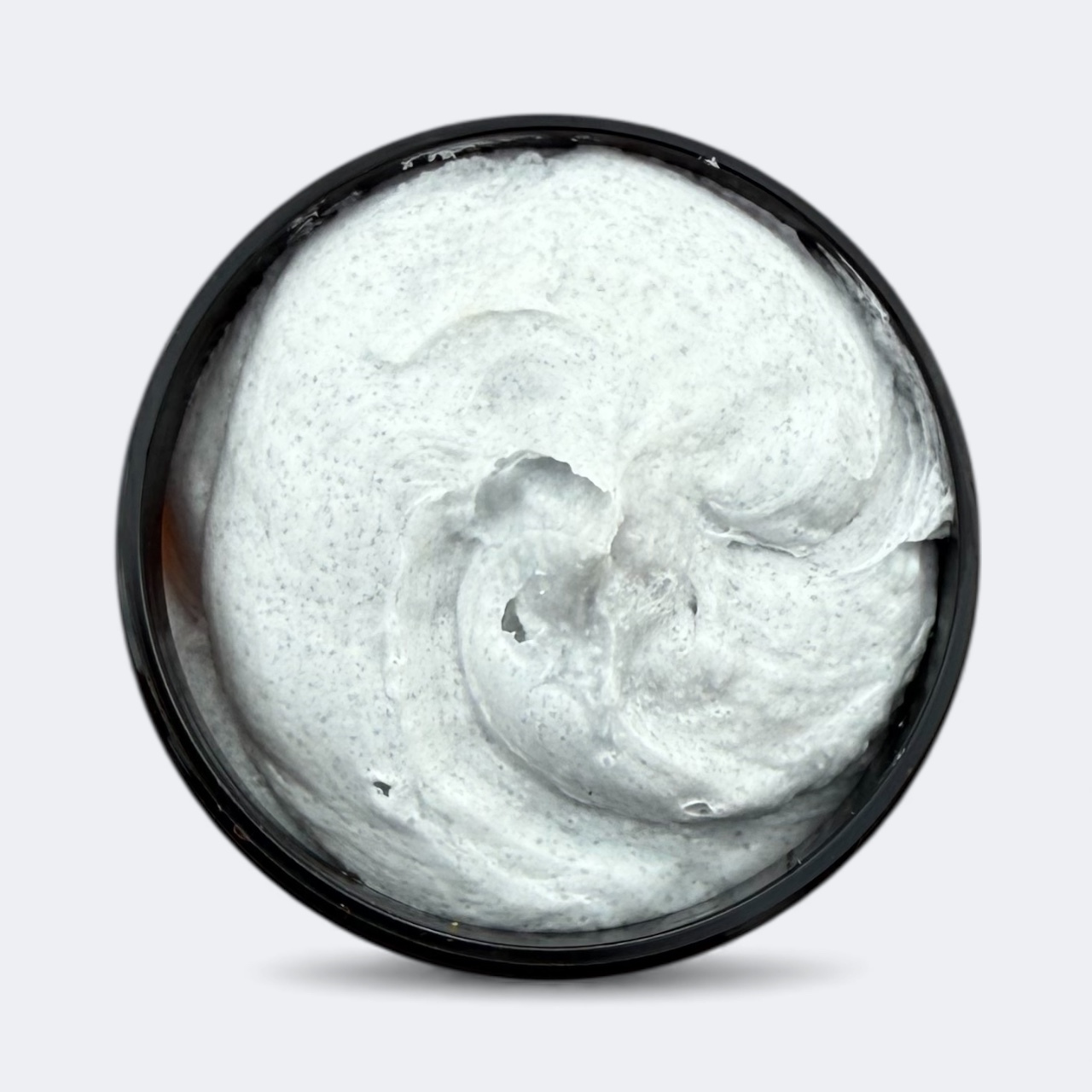 Creamy texture of foaming tallow bath butter and scrub with poppy seeds