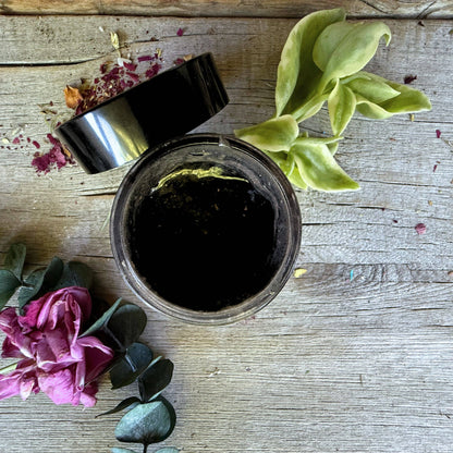 Close up of smooth black velvet detox gel mask on skin
