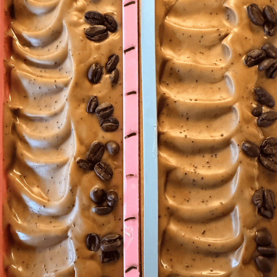 Using an exfoliating coffee tallow soap bar on dry arms and legs
