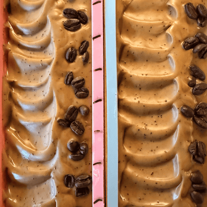 Using an exfoliating coffee tallow soap bar on dry arms and legs