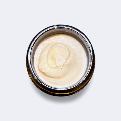 Applying a brightening coffee-infused tallow face cream to energize skin