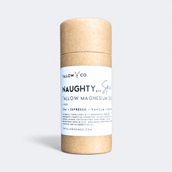 Naughty But Spice aluminum-free grass-fed tallow natural deodorant tube with long-lasting odor protection and dirty-chai scent.
