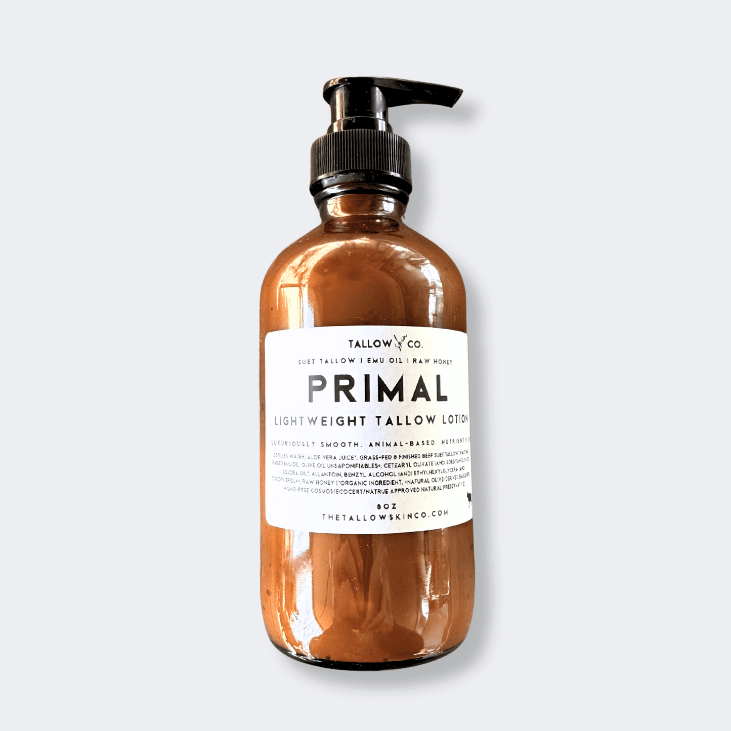 Primal Tallow Lotion with emu oil and raw honey in glass bottle – grass-fed ancestral moisturizer for deep hydration.
