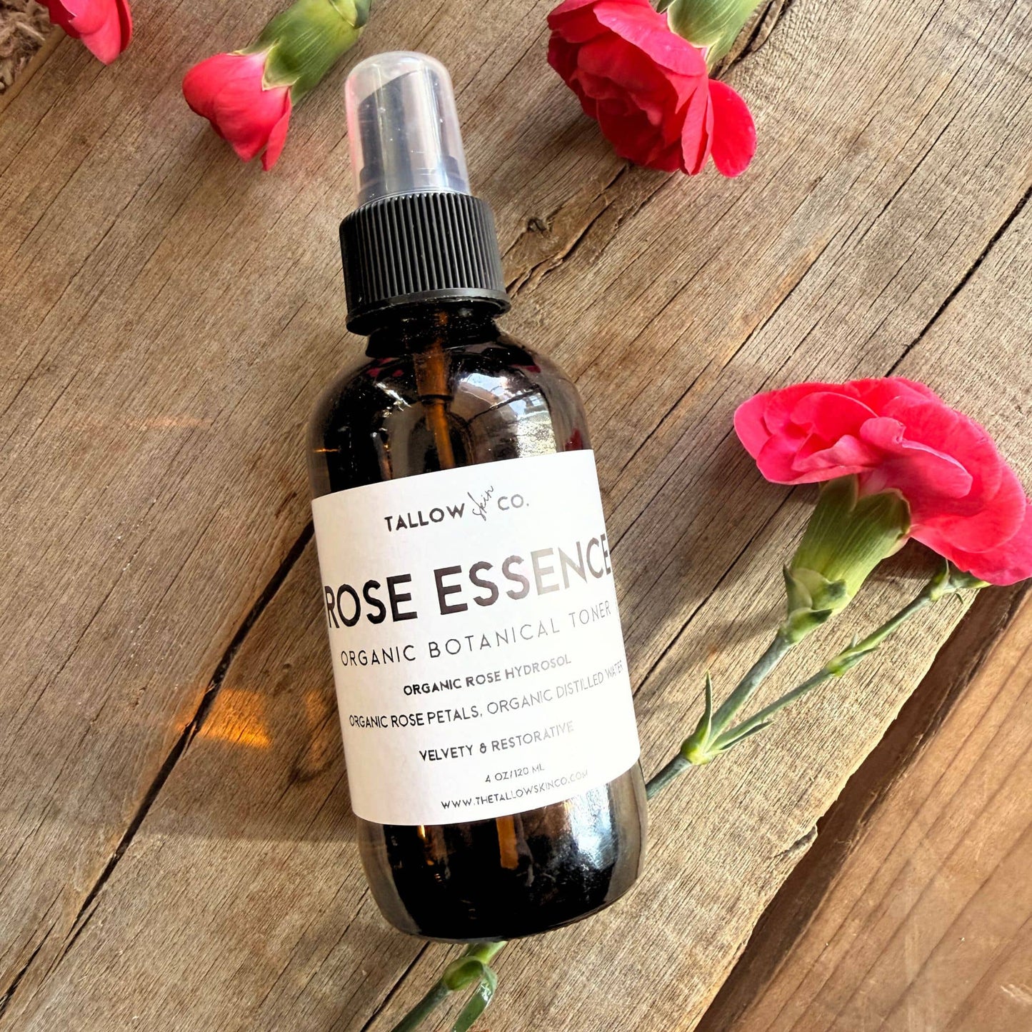 Alcohol-free rose hydrosol toner mist being applied to face for soothing hydration and balanced complexion