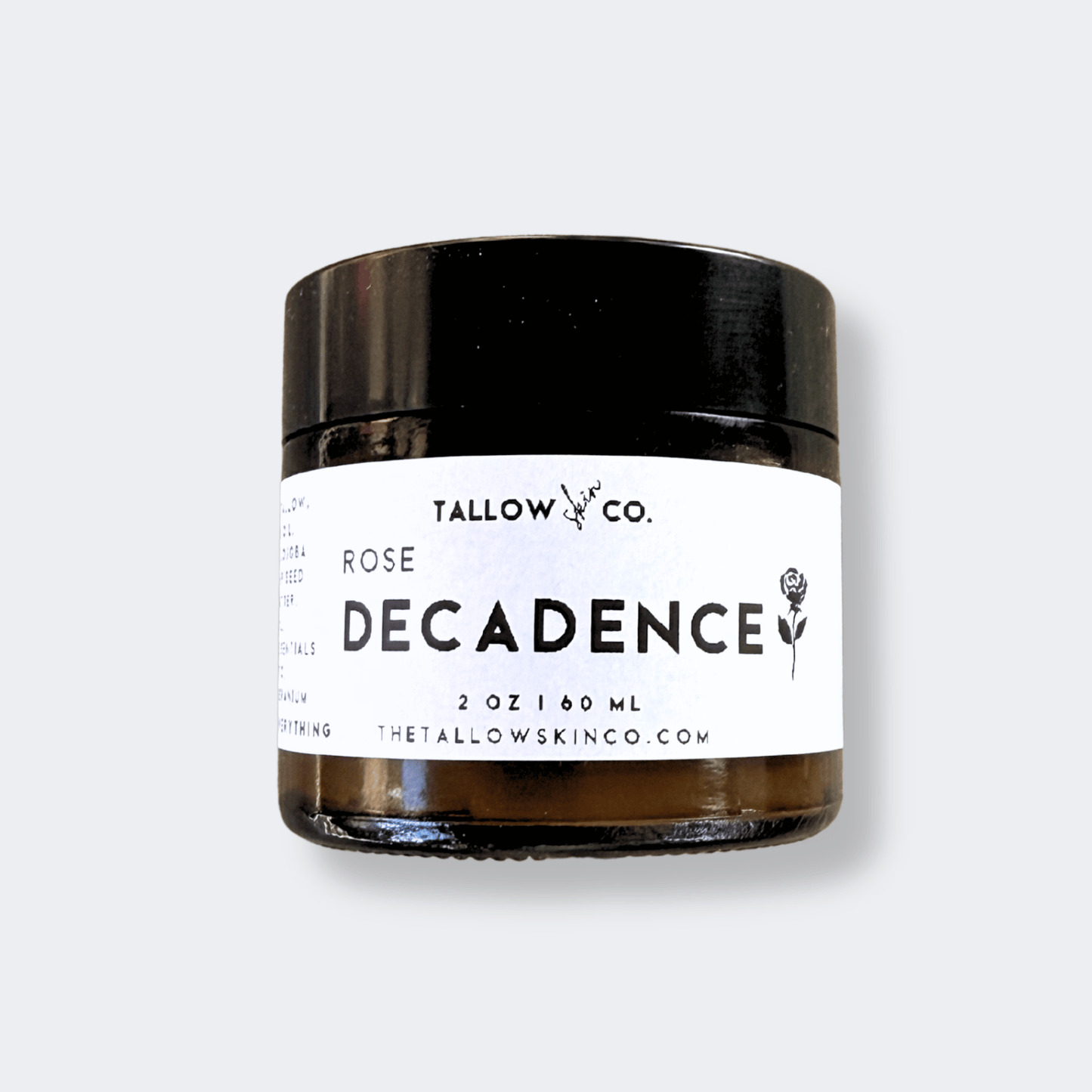 Rose Decadence Tallow Cloud Cream jar on a luxury marble surface