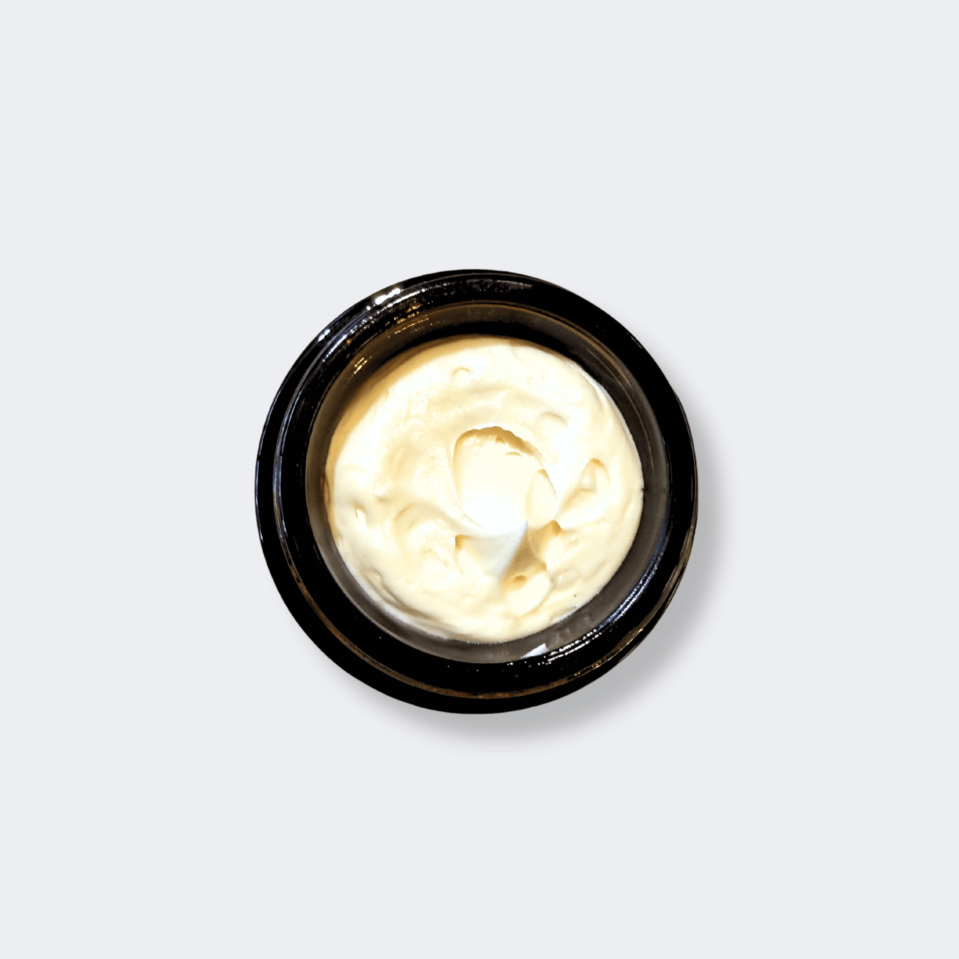 Application of Rose Decadence cream onto glowing, hydrated skin
