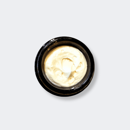 Application of Rose Decadence cream onto glowing, hydrated skin